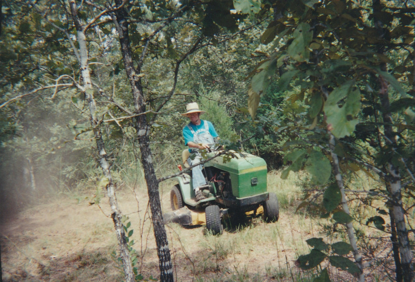Dow on tractor 09-14-2002
Searcy house place 
