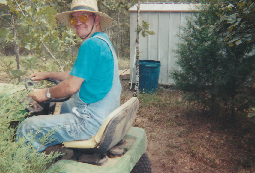 Dow on tractor 09-14-2002
Searcy house place 
